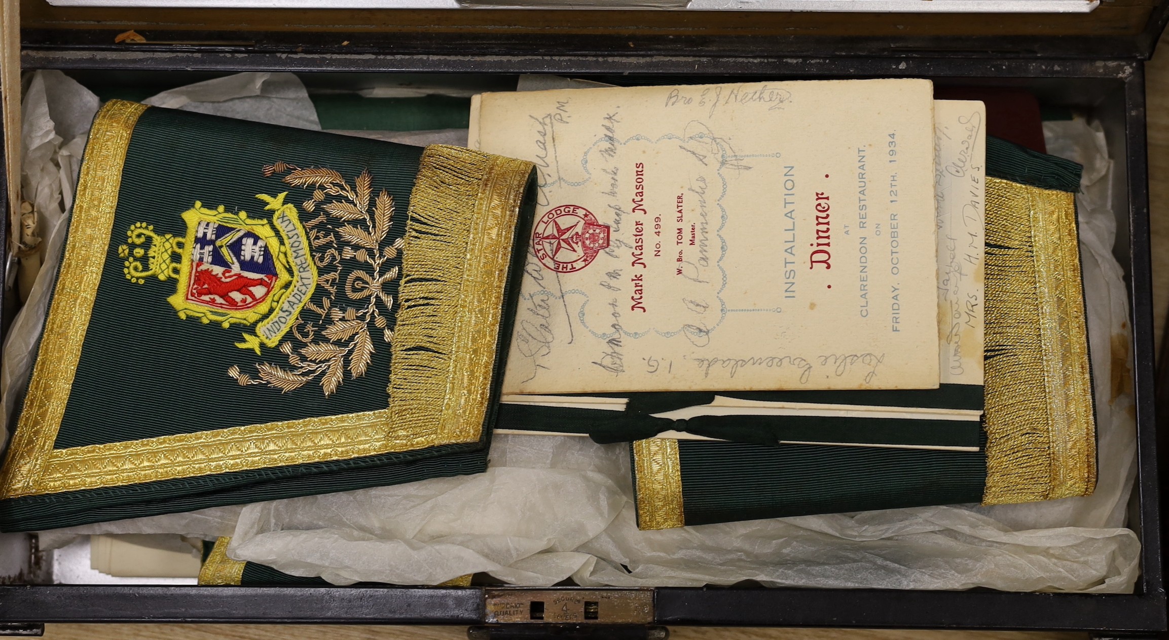 A collection of Masonic medals, cuffs and ephemera and, a W Masjid-1, Suleman Lodge Banquet menu autographed on the front cover and Proceedings of The Grand Lodge Bombay 1939, together in two suitcases